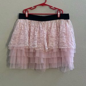 Short puffy pink lace skirt